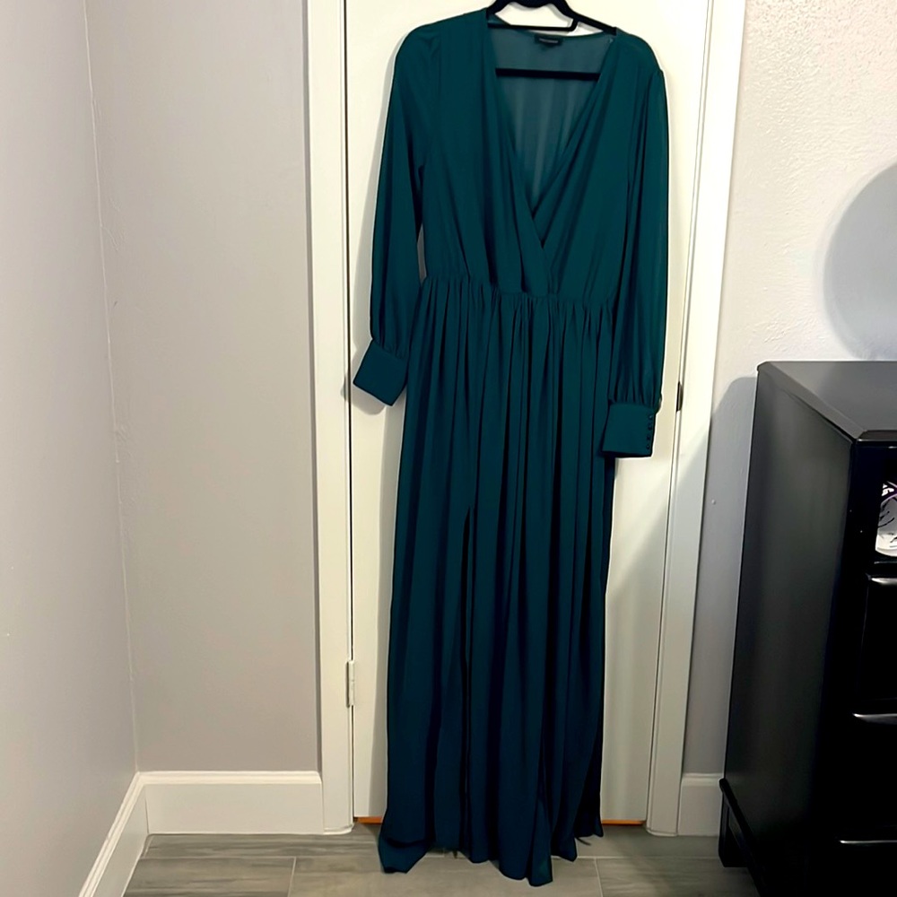 Beautiful green floor length semi sheer dress with side slits.